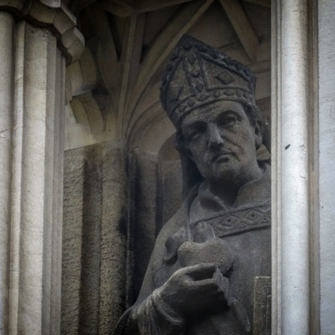 Carving on the outside of Gloucester Cathedral in England